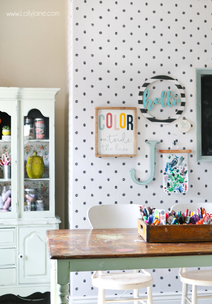 Such a fun craft room makeover! See how easy (and fun!) it is to transform a boring room into a trendy craft room with patterned wallpaper! This black and white peel and stick wallpaper easily transformed our craft room! #blackwhitewallpaper #peelstickwallpaper #craftroom #craftroommakeover #beforeafter