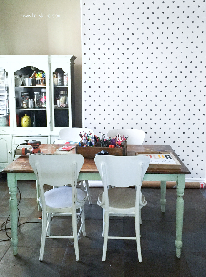 Check out how this peel and stick wallpaper transformed my craft room makeover. Love this easy to apply wallpaper in a fun polka dot pattern. #blackwhitewallpaper #howtoapplywallpaper #scribbledotpattern #wallpaperapplication #stickonwallpaper #wallpaperpeelstick