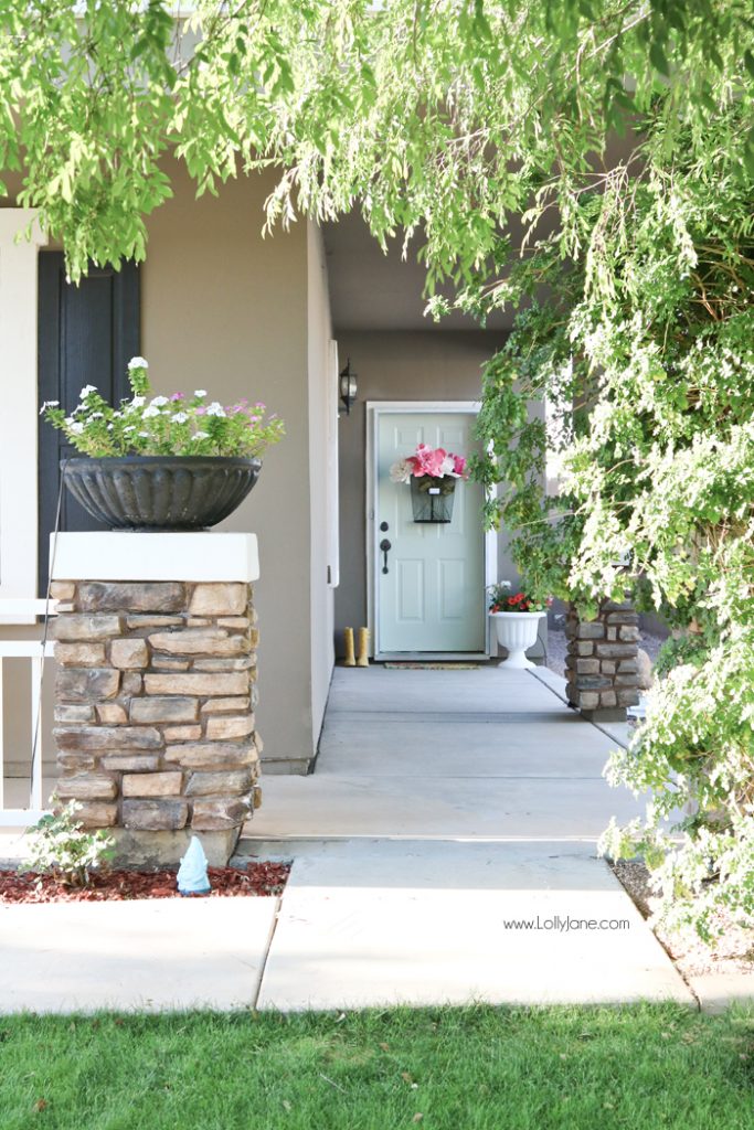 Easy Springy Porch Refresh... love this Door Makeover! Fast outdoor makeover idea, really cute home decor ideas! #diy #stencil #Dutchdoor #pinkdoor #makeover #porchdecor #porchmakeover