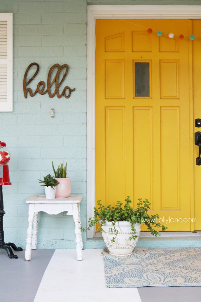 Colorful front porch ideas and tips, lots of pretty decor ideas by layering textures and patterns.