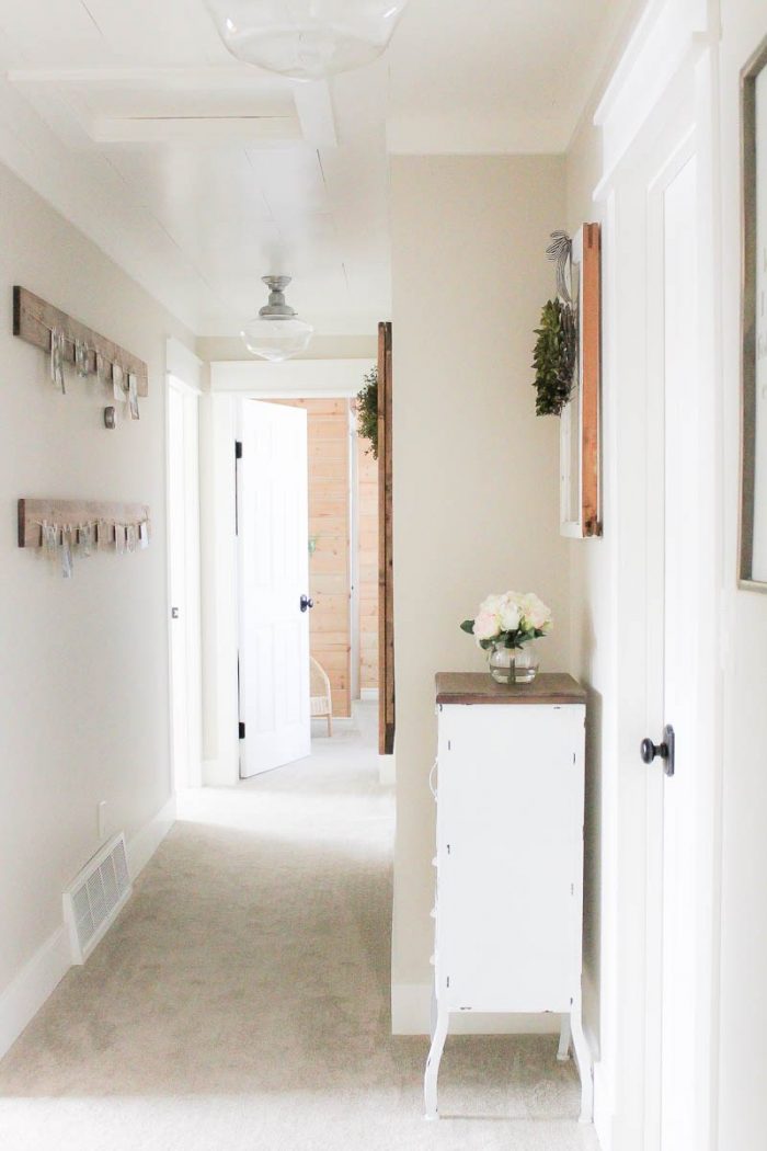 Pretty Farmhouse Style Hallway! via MakingItInTheMountains.com