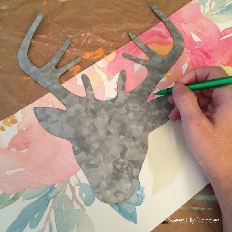 DIY floral deer head pallet art. Easy DIY deer head silhouette craft! Love this Rifle Paper Co floral covered metal deer head art!