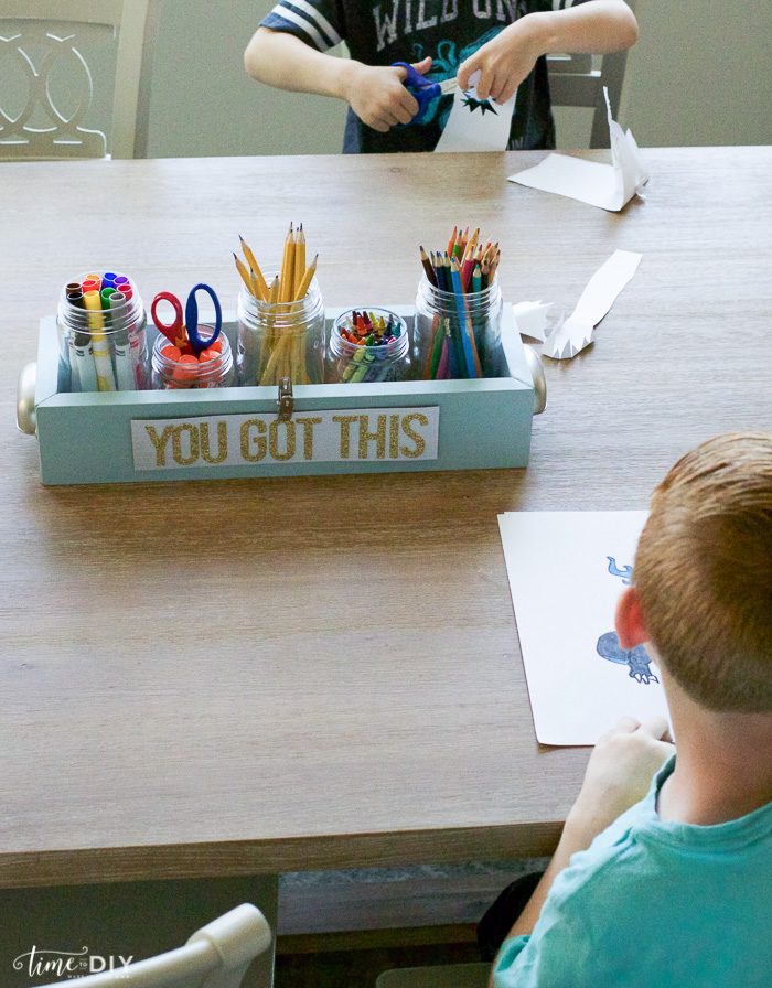 DIY Wood Caddy tutorial. Step by step to make this easy homework caddy, great way to coral your kids school supplies! Love this easy wood caddy tutorial!