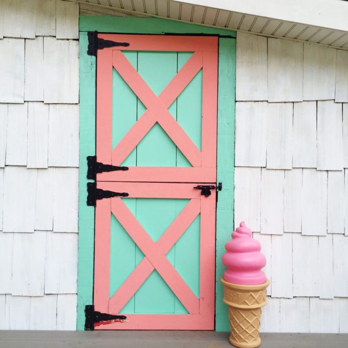 Darling old she shed turned playroom! Love the painted argyle + polka dot patterns! Too cute!