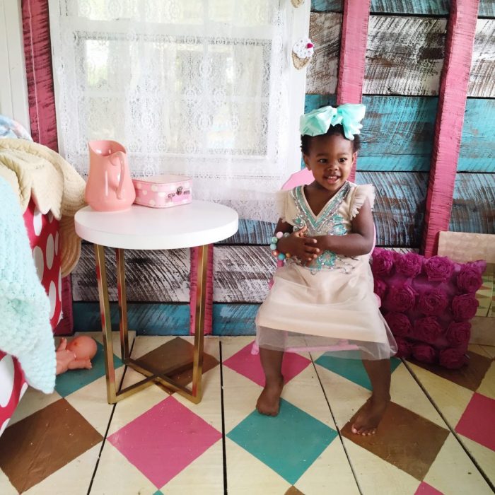 Darling old she shed turned playroom! Love the painted argyle, stripes + polka dot patterns! Too cute!