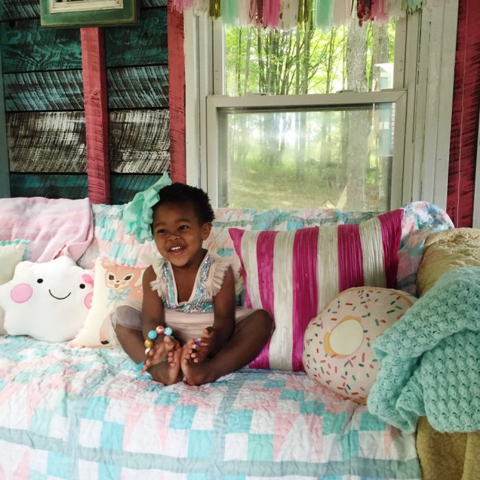 Darling old she shed turned playroom! Love the painted argyle, stripes + polka dot patterns! Too cute!