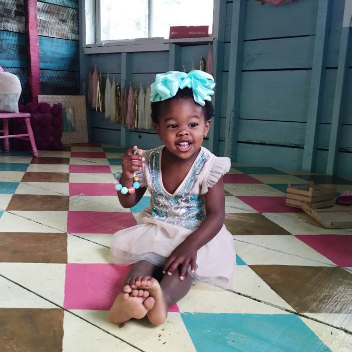 Darling old she shed turned playroom! Love the painted argyle, stripes + polka dot patterns! Too cute!