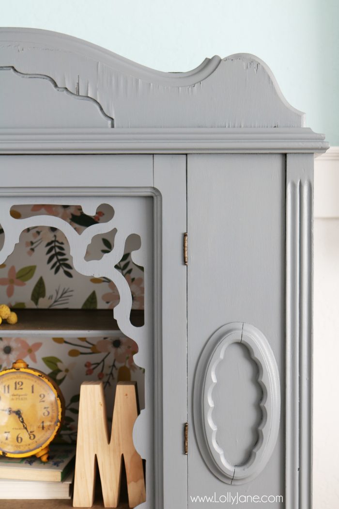 Gorgeous gray hutch with floral paper makeover. Such a dramatic before after furniture makeover. Love this gray hutch with pretty floral paper!