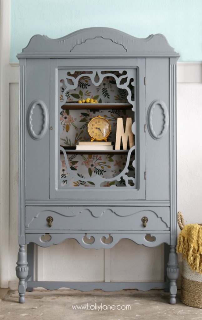 Gorgeous gray hutch with floral paper makeover. Such a dramatic before after furniture makeover. Love this gray hutch with pretty floral paper!