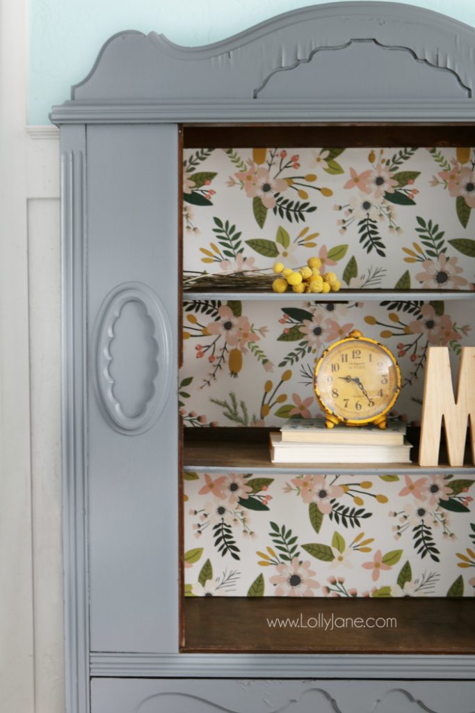 Gorgeous gray hutch with floral paper makeover. Such a dramatic before after furniture makeover. Love this gray hutch with pretty floral paper!