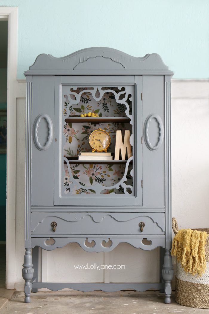 Gorgeous gray hutch with floral paper makeover. Such a dramatic before after furniture makeover. Love this gray hutch with pretty floral paper!