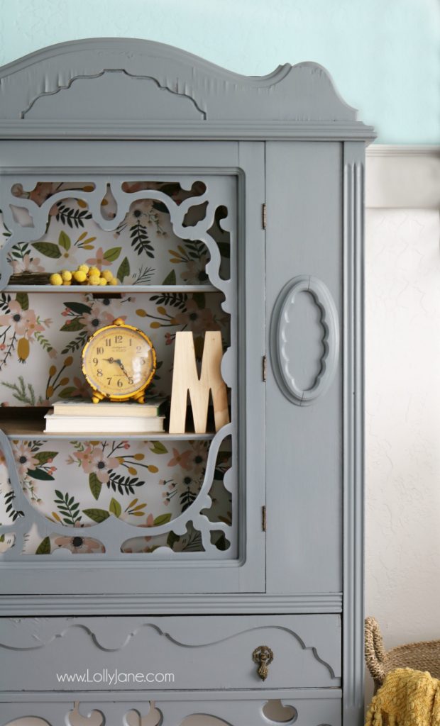 Gorgeous gray hutch with floral paper makeover. Such a dramatic before after furniture makeover. Love this gray hutch with pretty floral paper!