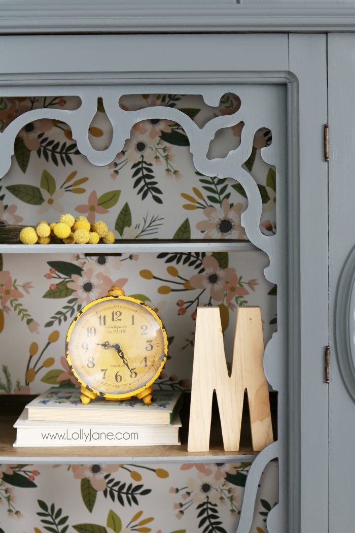 Gorgeous gray hutch with floral paper makeover. Such a dramatic before after furniture makeover. Love this gray hutch with pretty floral paper!