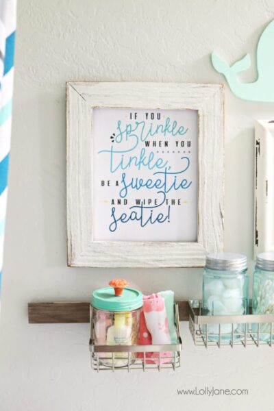 Cute kids bathroom! Refreshed for less than $100 and super organized... love the printable art, too!