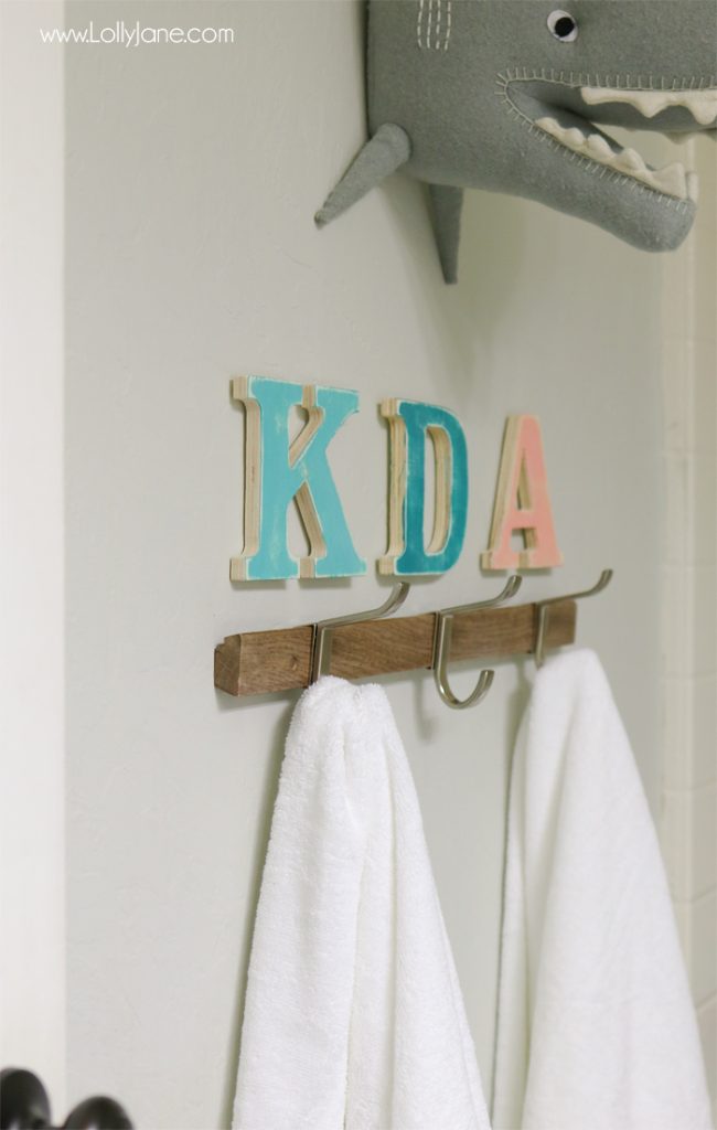 Cute kids bathroom! Refreshed for less than $100 and super organized... love the printable art, too!