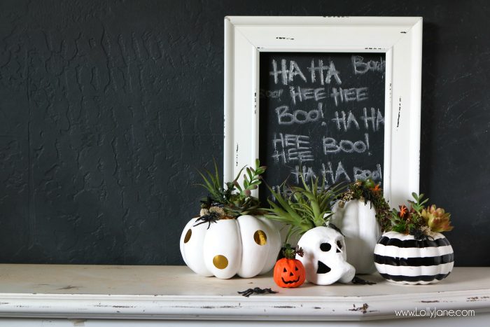 DIY Halloween Pumpkin Succulent Planters. These FAUX pumpkins + succulents are low maintenance and hassle free on your festive mantel or porch! CUTE!!!