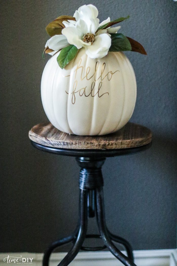 DIY Faux Magnolia Pumpkin | Such a cute fall pumpkin home decor craft! Love this hello fall pumpkin decor! Cute fall decor!