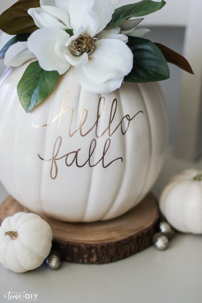 DIY Faux Magnolia Pumpkin | Such a cute fall pumpkin home decor craft! Love this hello fall pumpkin decor! Cute fall decor!