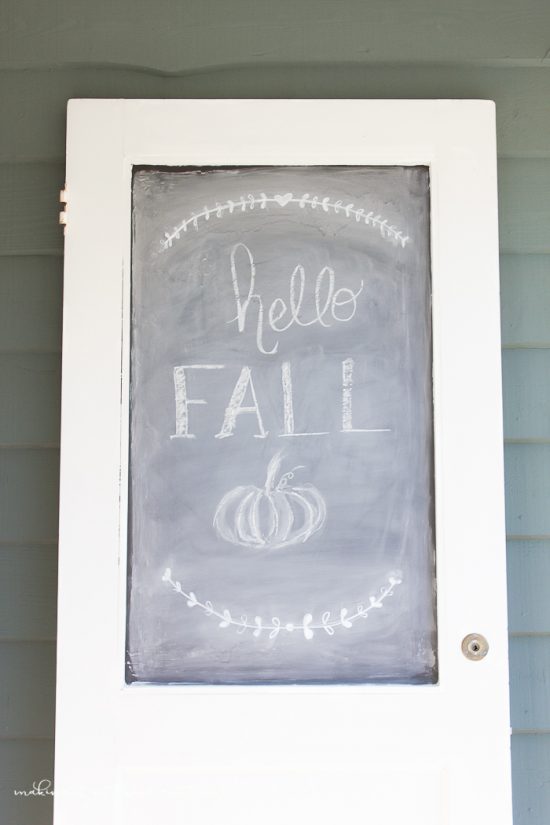 DIY Vintage Door Chalkboard tutorial: Turn an old door into a chalkoard, such a great upcycle! Love this vintage door repurpose! Great fall porch decor ideas!