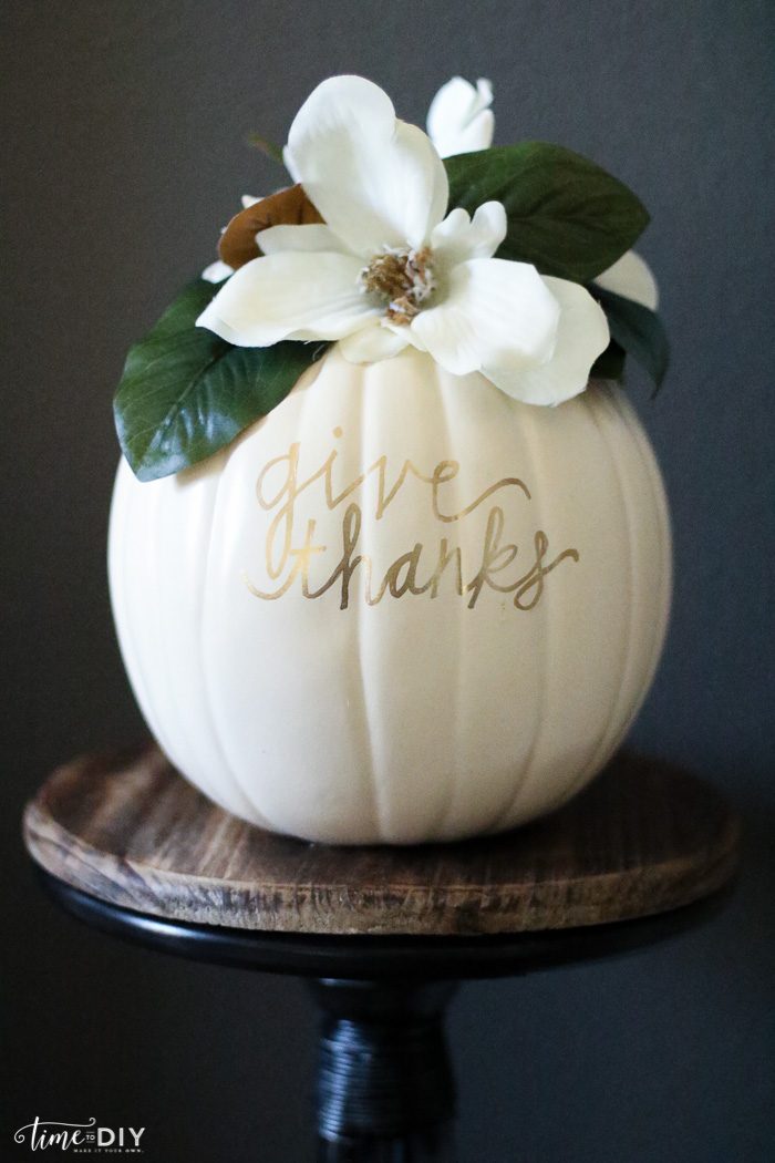 DIY Faux Magnolia Pumpkin | Such a cute fall pumpkin home decor craft! Love this hello fall pumpkin decor! Cute fall decor!