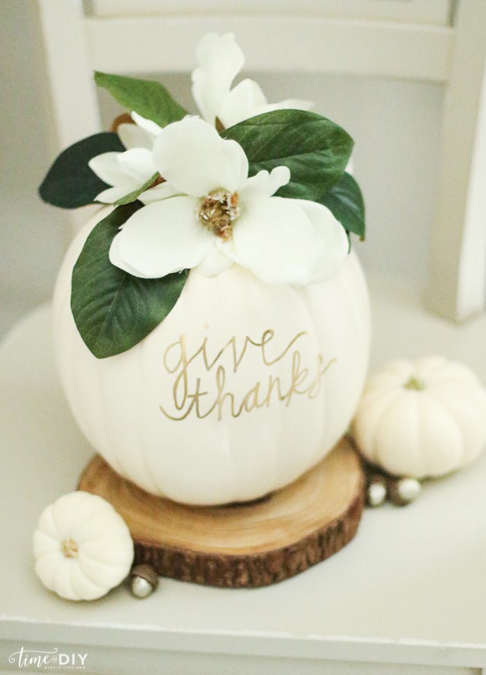 DIY Faux Magnolia Pumpkin | Such a cute fall pumpkin home decor craft! Love this hello fall pumpkin decor! Cute fall decor!