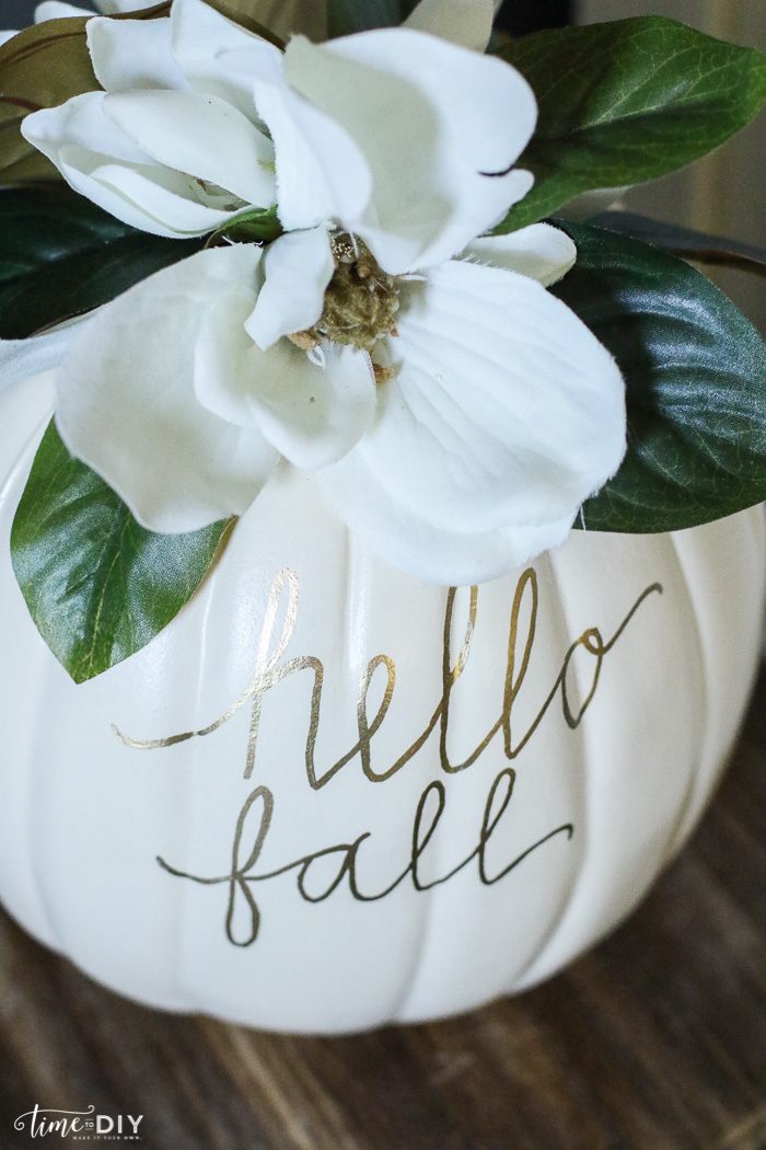 DIY Faux Magnolia Pumpkin | Such a cute fall pumpkin home decor craft! Love this hello fall pumpkin decor! Cute fall decor!