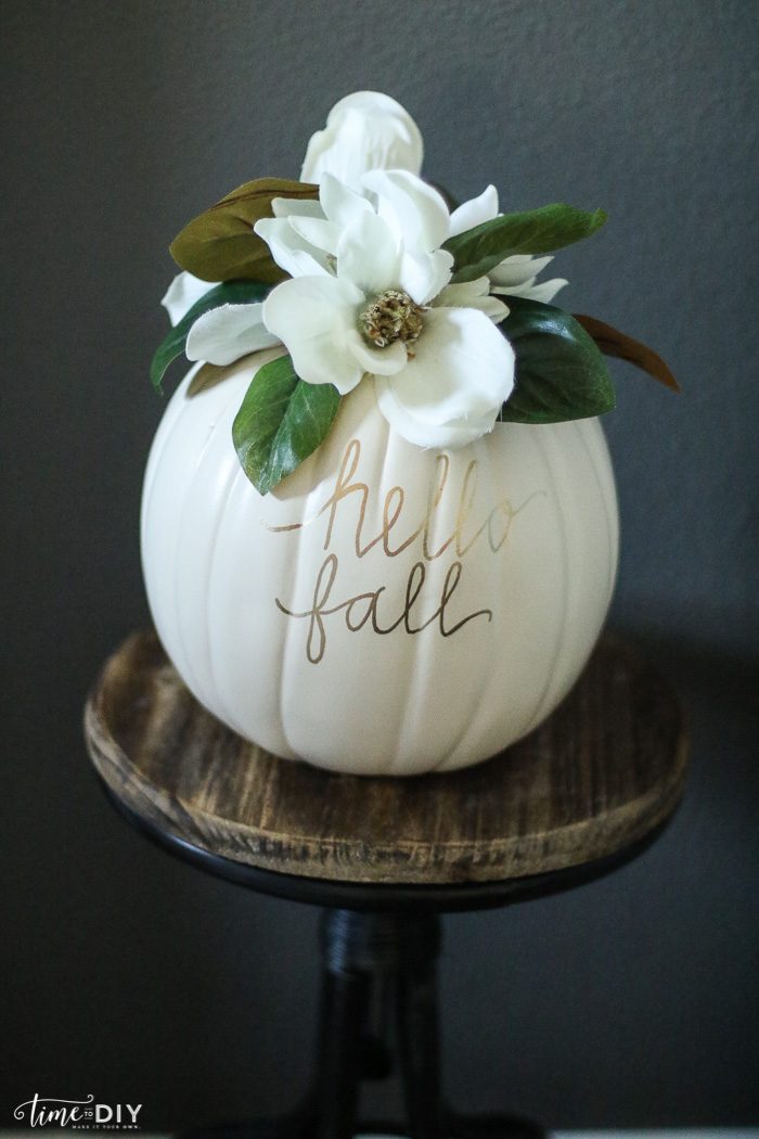 DIY Faux Magnolia Pumpkin | Such a cute fall pumpkin home decor craft! Love this hello fall pumpkin decor! Cute fall decor!