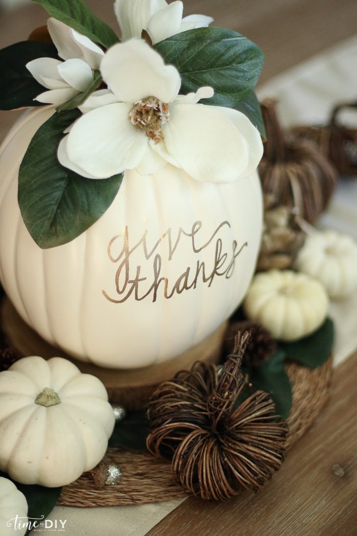 DIY Faux Magnolia Pumpkin | Such a cute fall pumpkin home decor craft! Love this hello fall pumpkin decor! Cute fall decor!