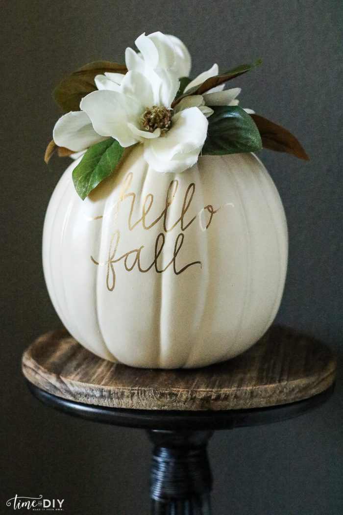 DIY Faux Magnolia Pumpkin | Such a cute fall pumpkin home decor craft! Love this hello fall pumpkin decor! Cute fall decor!