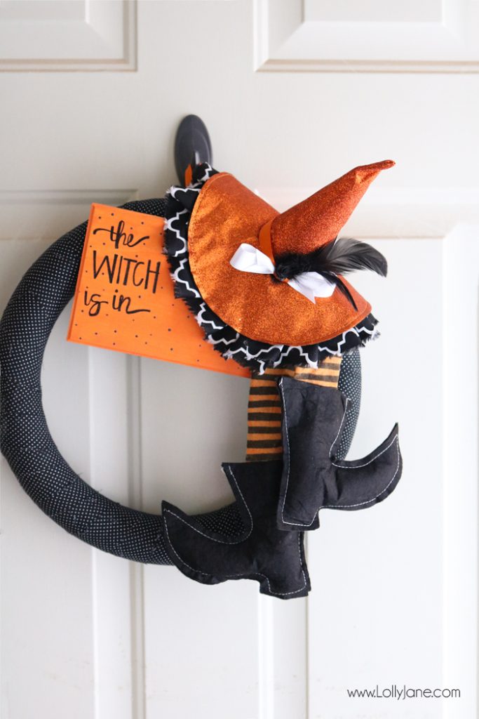 Super cute and EASY fabric wrapped Halloween witch wreath. Love the handmade sign "The Witch is In!"