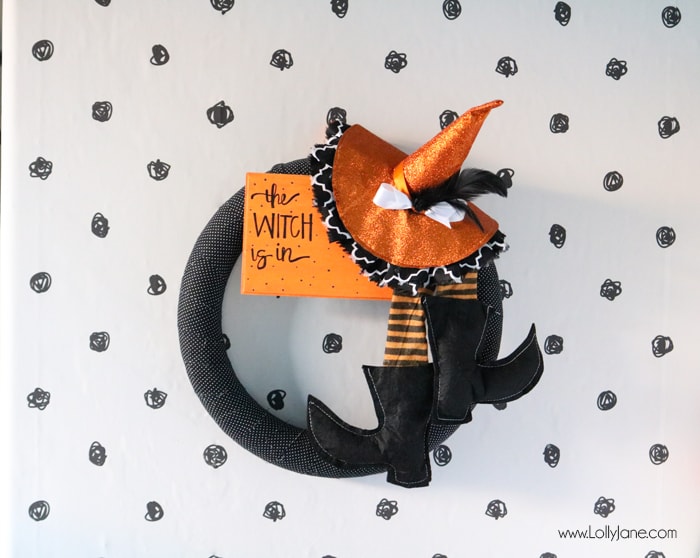 Super cute and EASY fabric wrapped Halloween witch wreath. Love the handmade sign "The Witch is In!"