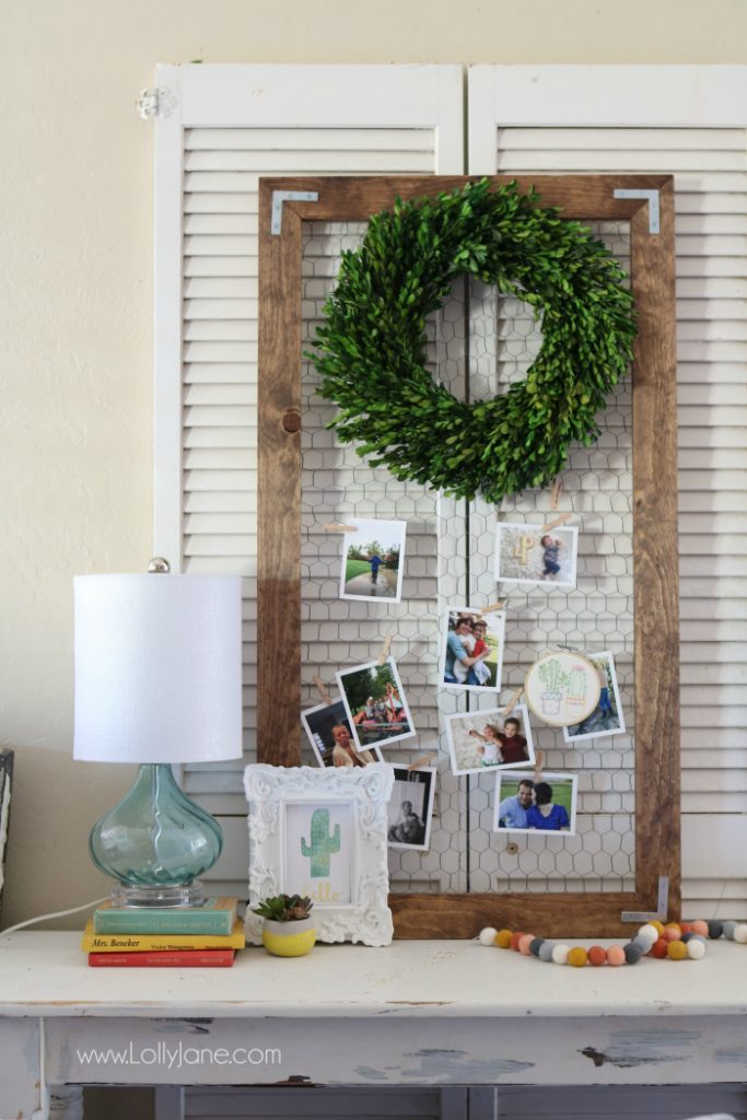 Love this easy to build rustic photo display. Such a cute way to share pictures! Cute chicken wire frame idea to display pictures!