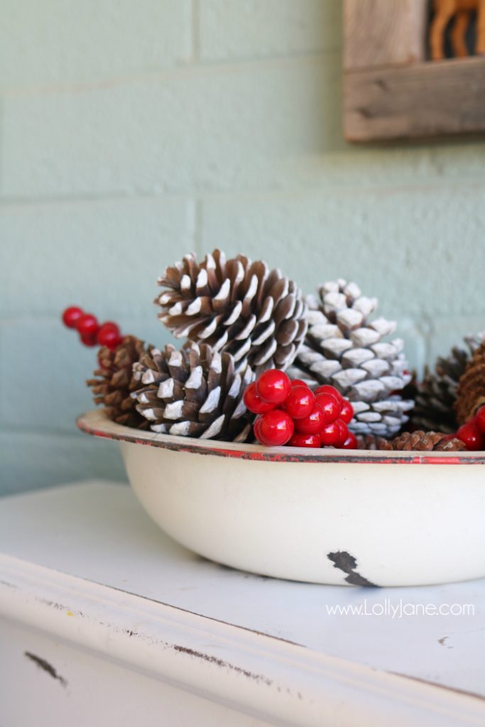 Farmhouse Christmas porch decor. Easy ways to bring a little farmhouse charm to the outdoors. Love the olive buckets and fresh boxwood wreaths.