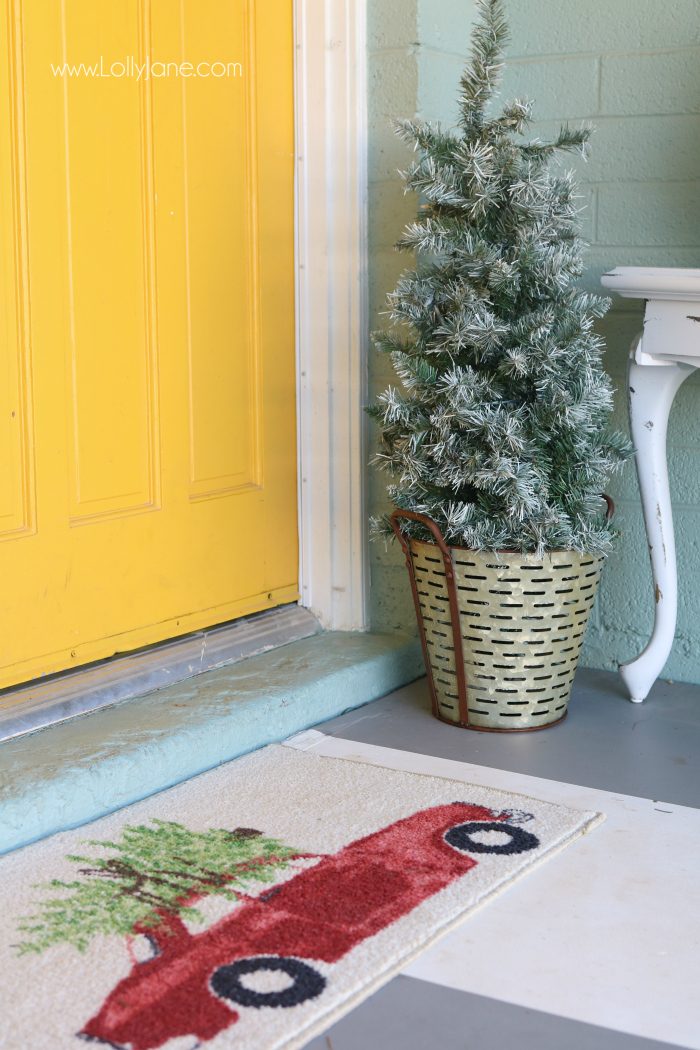 Farmhouse Christmas porch decor. Easy ways to bring a little farmhouse charm to the outdoors. Love the olive buckets and fresh boxwood wreaths.