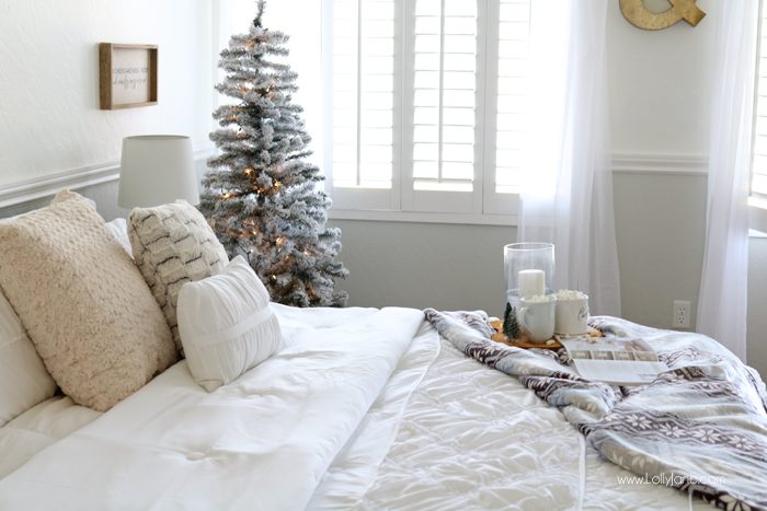 Cozy Christmas Master Bedroom... click to see the rest of the space decked out in a winter wonderland!