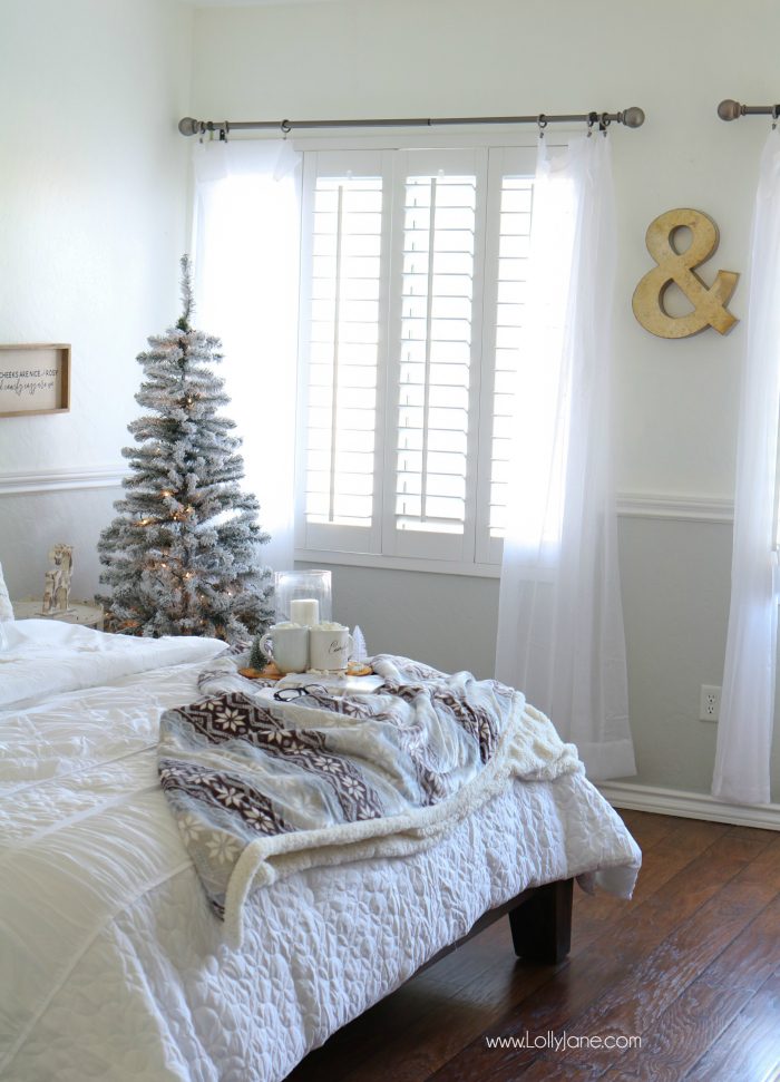 Cozy Christmas Master Bedroom... click to see the rest of the space decked out in a winter wonderland!