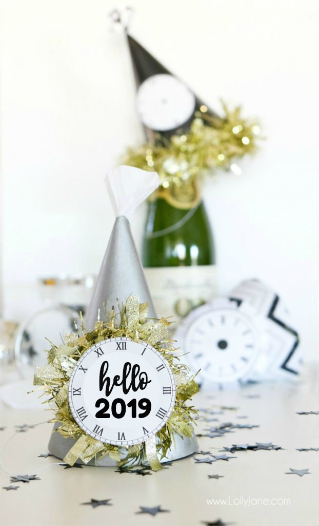 Paint or wrap fabric around dollar store party hats for EASY and cheap glam New Years Eve party gear! Cute!