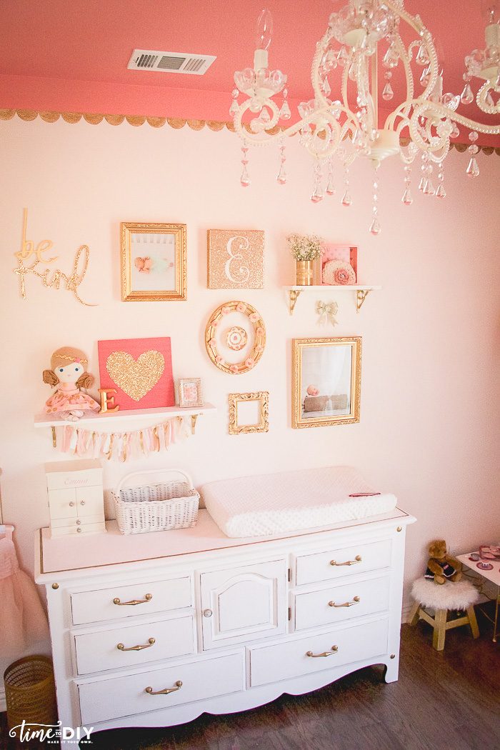 How to create and hang a cute gallery wall, perfect for a girls room or nursery!