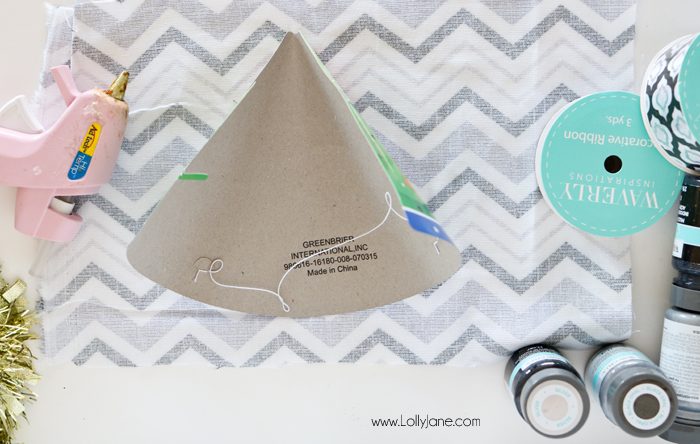 Paint or wrap fabric around dollar store party hats for EASY and cheap glam New Years Eve party gear! Cute!