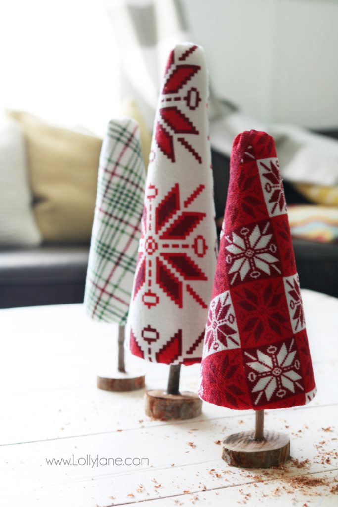 Fun DIY ugly sweater trees craft! These "ugly sweater" trees are cute Christmas decor and make a great centerpiece! Easy Christmas craft idea! Upcycle inexpensive hand towels into Ugly Sweater Christmas trees!