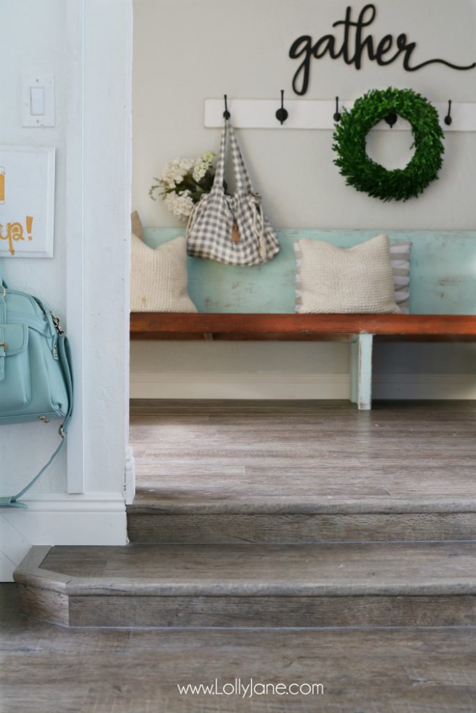 Love these vinyl floors from @GoHaus. They look great in my farmhouse style home! Adore this farmhouse entrway and gather wood cutout too!