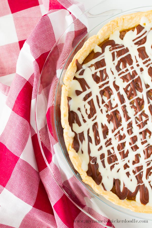 Fudge Brownie Pie recipe. This pie is some of the best comfort food that can be found! A must try chocolately fudge brownie pie!