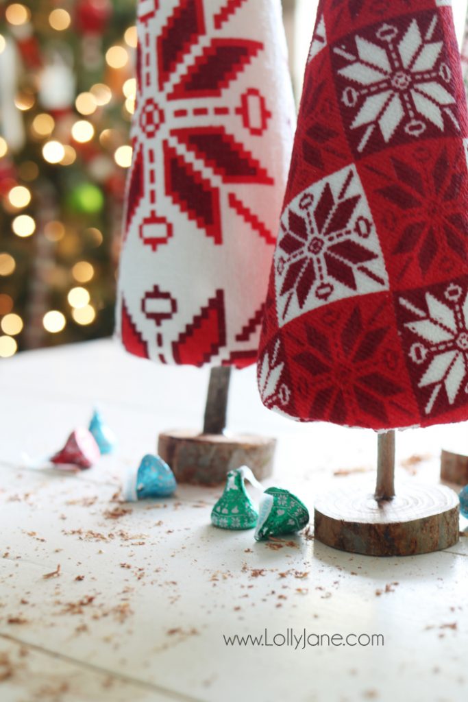 Fun DIY ugly sweater trees craft! These "ugly sweater" trees are cute Christmas decor and make a great centerpiece! Easy Christmas craft idea! Upcycle inexpensive hand towels into Ugly Sweater Christmas trees!