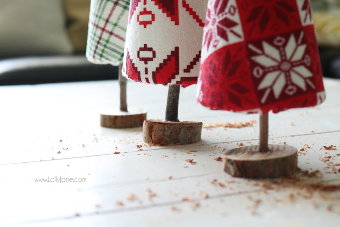 Fun DIY ugly sweater trees craft! These "ugly sweater" trees are cute Christmas decor and make a great centerpiece! Easy Christmas craft idea! Upcycle inexpensive hand towels into Ugly Sweater Christmas trees!