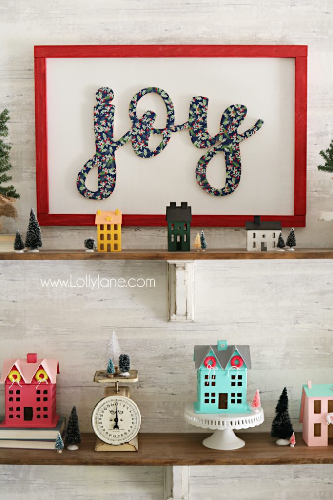 DIY wood cutout sign tutorial. Learn how to cover a wood cutout with paper the proper way then mount to a sign! Such an easy to follow sign tutorial. Love this diy sign. Cute joy sign!