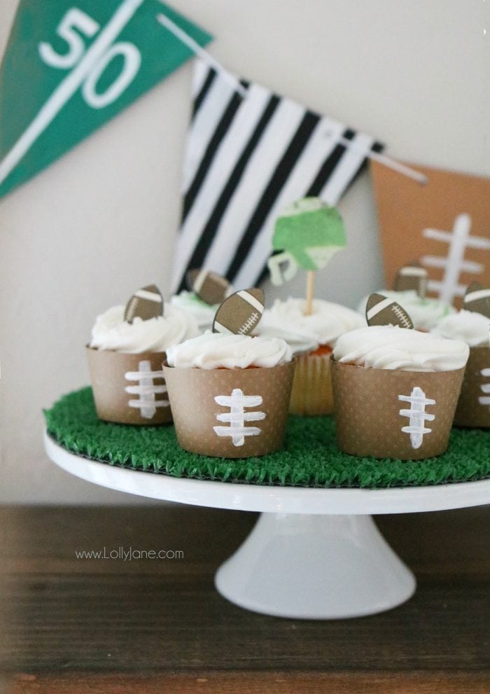 Easy Football decorations to make for Game Day! From football cupcake wrappers to an astro turf cake stand and football pennant, simple crafts you can make with the kids!