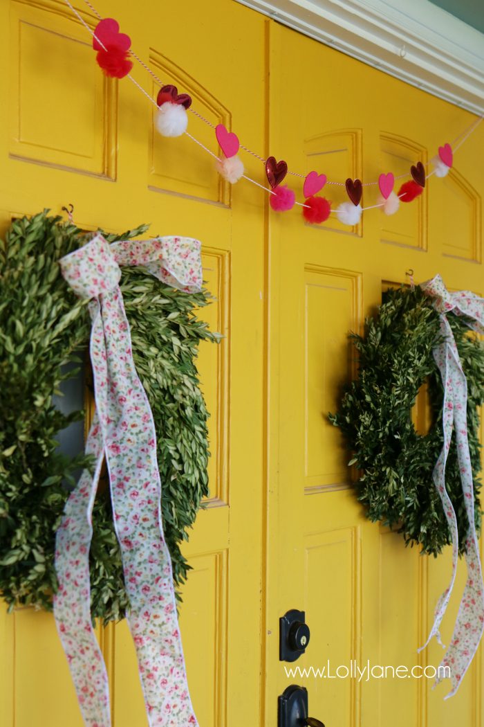 Simple Valentine's Day porch decor. Love this colorful front porch with pops of pink and red for Valentine's Day outdoor decor ideas.