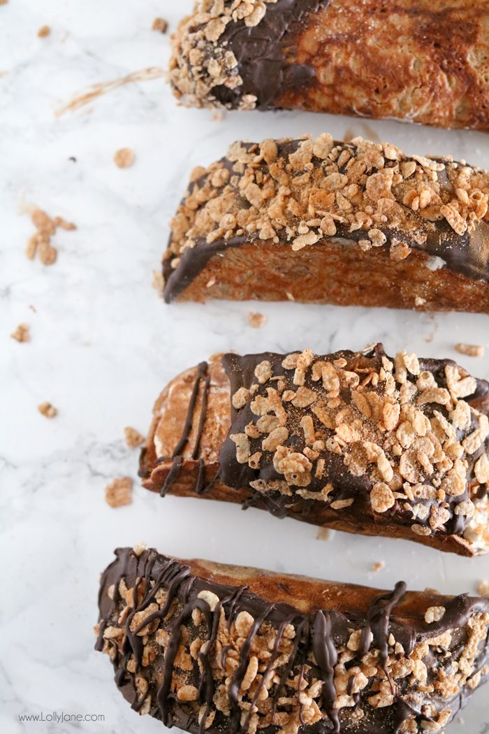 Easy Cinnamon Choco Tacos, made with Cinnamon Pebbles and ice cream topped with cinnamon, so good!