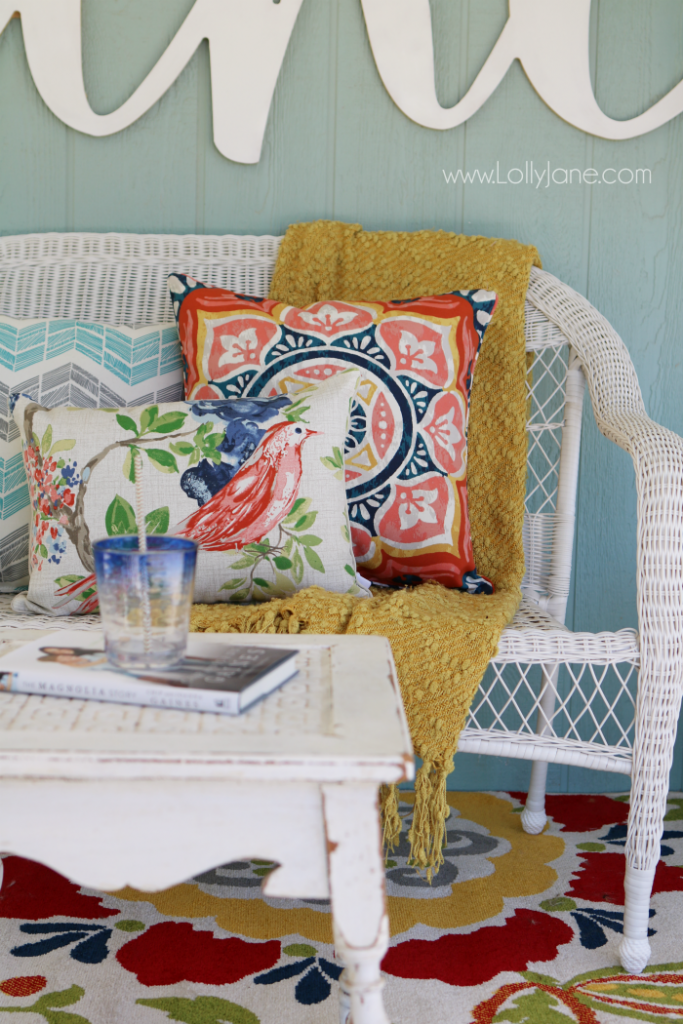 Love these affordable patio porch decor ideas! Add a neutral bench then fill it up with accessories for some easy decor ideas. Click through for inexpensive sources, so easy to create this back porch look!