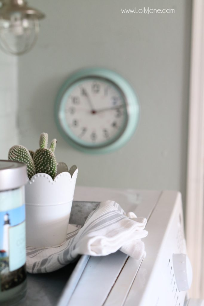 Easy step-by-step tips to spruce up your laundry room on a budget! We transformed this space for less than $300!